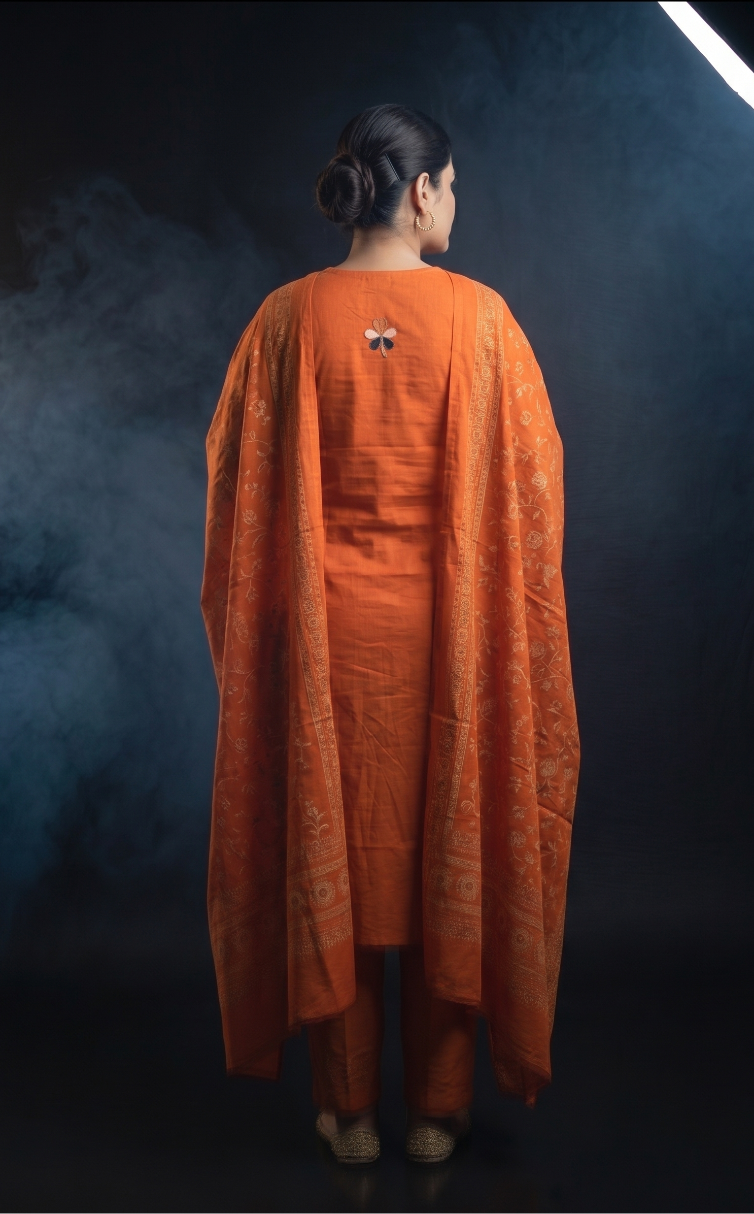 Rust Banarasi kurta close-up floral appliqué and gold placket detail